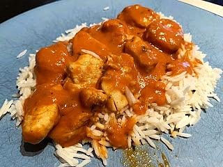 Butter chicken over basmati rice
